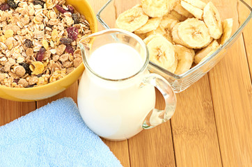 Delicious and healthy cereal in bowl with milk