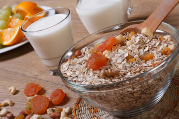 Oat flakes with dried fruit and milk and fresh fruit