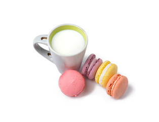 colored macaroons with tasty milk