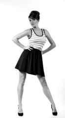 Portrait of beautiful young woman with makeup in fashion clothes