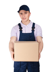 Workman in overalls and blue peaked cap keeps a parcel box 