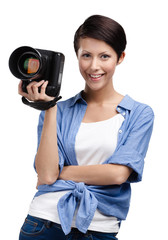 Lady takes images holding photographic camera