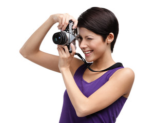 Woman in spectacles hands retro photographic camera, isolated