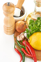Fresh cooking ingredients with olive oil