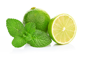 Limes and mint isolated on white background