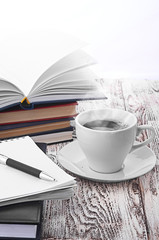 Cup of coffee on a wooden table