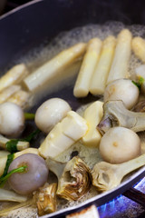 Cooking vegetables with butter in a pan