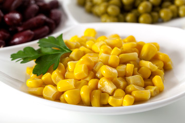 Yellow corn on white plate