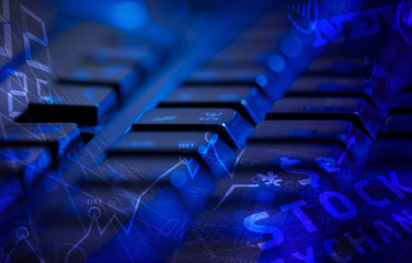 Keyboard with glowing business icons