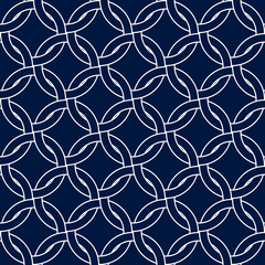 Geometric woven circles seamless pattern in blue and white