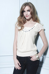 portrait of beautiful young woman posing in studio