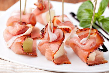 Prosciutto on a white plate