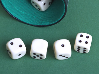  Dices on a green background.