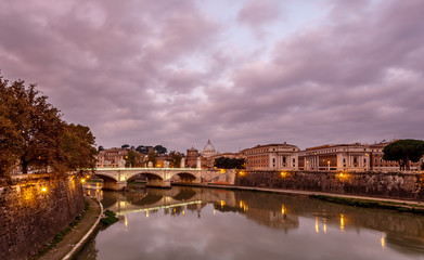 Illuminated Tiber River Embankment and Saint Peter's Cathedral i