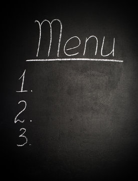 menu is written in chalk on  blackboard