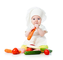 baby girl with vegetables