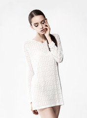 Fashion model pose on gray background