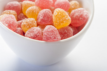 Delicious colorful jelly candy on a white background