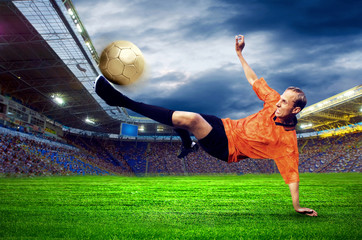 Naklejka premium Football player on field of stadium