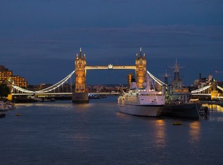 Fototapeta na wymiar Illuminated Tower Bridge at night in London, England
