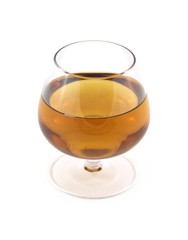 Glass with amber wine isolated on white close up
