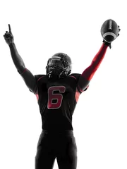 Fotobehang american football player  portrait celebrating touchdown silhoue © snaptitude