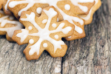 Decorated Christmas cookies over wood