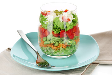 Tasty salad with fresh vegetables, isolated on white