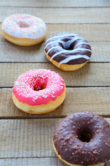 donuts with chocolate icing and colored