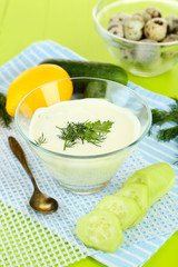 Cucumber yogurt in glass bowl,