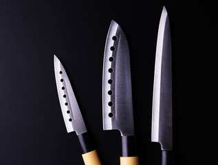Kitchen knife isolated on black