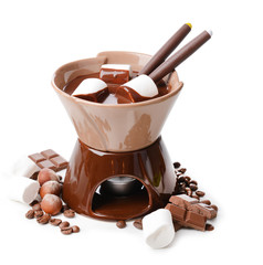 Chocolate fondue with marshmallow candies, isolated on white