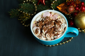Hot chocolate with cream in color mug,