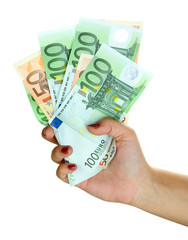 Female hand with euro close up isolated on white