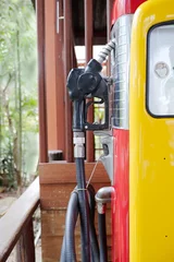 Fotobehang Vintage photo of retro gas pump © eaohm