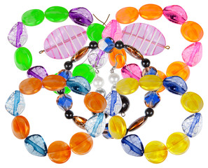 Fototapeta na wymiar Bracelets and earrings made of handmade glass. Collage
