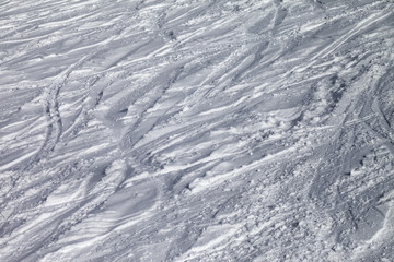 Fototapeta premium Background of ski slope with trace from ski and snowboards