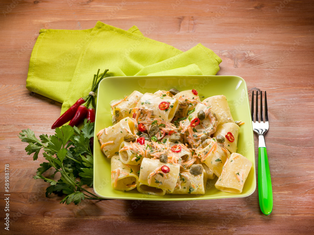 Wall mural paccheri with carrot capers and hot chili pepper