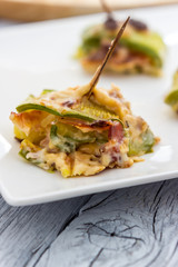 Zucchini and bacon rolls baked