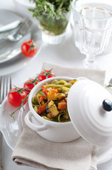 Dietary pasta with spinach, zucchini and cherry tomatoes