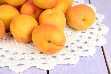 Fresh natural apricot on wooden table close up