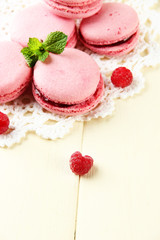 Gentle macaroons on table close-up