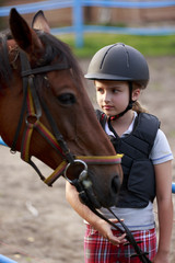 Obraz premium Horse and lovely equestrian girl