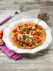 chickpeas focaccia with mushroom tomatoes olives,selective focus