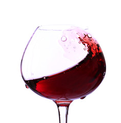 Wineglass with red wine, isolated on white