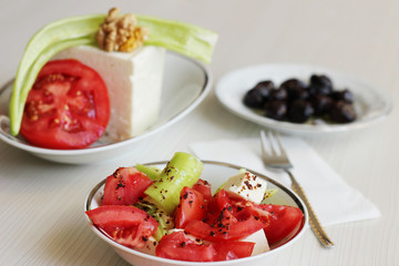 black olives, tomatoes, cheese and walnut