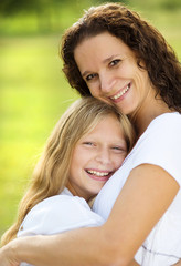 Fototapeta premium Mother and daughter hugging