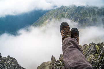 Trekker resting high in the mountains
