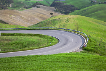 Winding road in Tuscany landscape