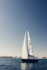 Sailing ship yachts with white sails